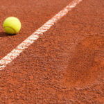 Les Avantages Sportifs de Jouer sur un Court de Tennis en Terre Battue à Saint Genis Laval